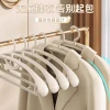 The clothes hanger is seamless, shoulder-free, anti-slip and anti-shoulder corner. It is made of plastic and can be used for drying dry and wet clothes. It is thickened and used for hanging clothes on the balcony details Picture